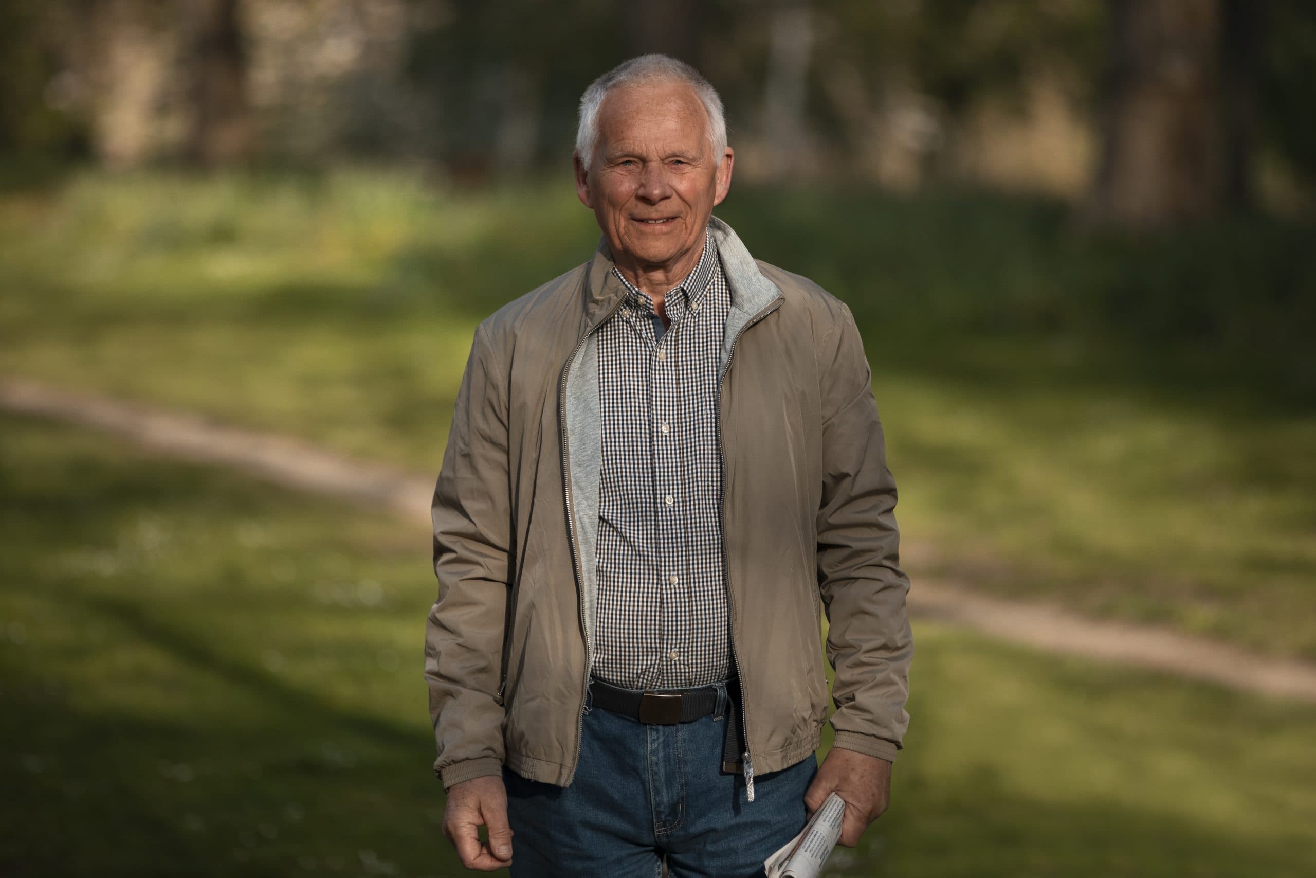 Senior man standing outdoors
